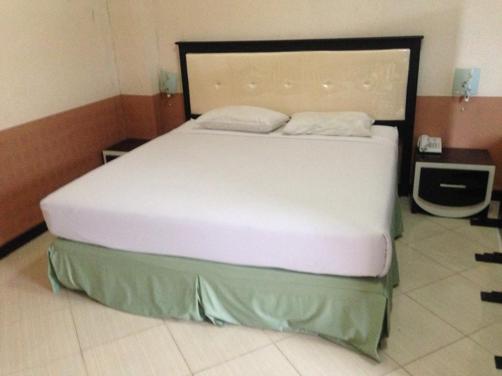 Global Inn Keluarga Sedati 部屋 写真