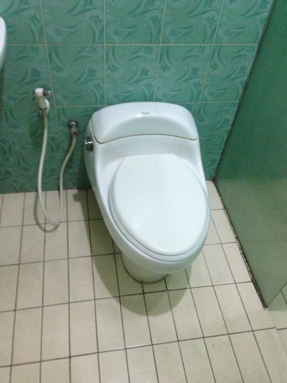 Global Inn Keluarga Sedati 部屋 写真